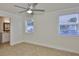 This bedroom features an attached bathroom and natural light at 404 12Th Sw St, Ruskin, FL 33570