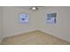 Bright and airy bedroom with tile floors and natural light at 404 12Th Sw St, Ruskin, FL 33570