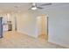 Spacious living room with tile flooring and an arched doorway at 404 12Th Sw St, Ruskin, FL 33570