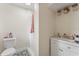 Spacious bathroom with a vanity, shower/tub combo, and black-and-white patterned tile floor at 4600 Chancellor Ne St, St Petersburg, FL 33703