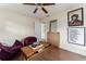 Comfortable living room featuring a ceiling fan, wood flooring, and ample space for relaxation at 4600 Chancellor Ne St, St Petersburg, FL 33703