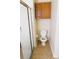 Bathroom featuring a toilet and a glass enclosed shower at 4633 Mapletree Loop, Wesley Chapel, FL 33544