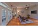 Spacious living room features hardwood floors and natural light at 4942 Willow Ridge Ter, Valrico, FL 33596
