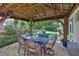 Inviting outdoor patio features ceiling fans and comfortable seating, perfect for relaxation at 4942 Willow Ridge Ter, Valrico, FL 33596
