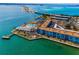 Expansive aerial view features waterfront condos, a pool, and scenic waterways at 5 Gateshead Dr # 308, Dunedin, FL 34698