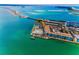 Panoramic aerial view showcases condos, bridge access, and coastal waterways at 5 Gateshead Dr # 308, Dunedin, FL 34698