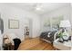 Cozy bedroom with hardwood floors, natural light, and interior views at 516 14Th Ne Ave, St Petersburg, FL 33701
