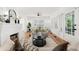 Bright living room with fireplace and hardwood floors at 516 14Th Ne Ave, St Petersburg, FL 33701