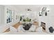 Bright and airy living room with fireplace and French doors at 516 14Th Ne Ave, St Petersburg, FL 33701