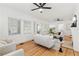 Bright living area with hardwood floors, fireplace, neutral paint and many windows creates an inviting space at 516 14Th Ne Ave, St Petersburg, FL 33701