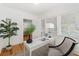 Sun-filled office with desk, chair, and view into other rooms at 516 14Th Ne Ave, St Petersburg, FL 33701