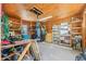 Organized storage building features shelves, pegboard and tools at 516 14Th Ne Ave, St Petersburg, FL 33701
