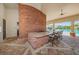 Entertain your guests at the outdoor kitchen bar while enjoying the pool views in this community space at 5225 5Th N Way, St Petersburg, FL 33703