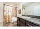 Bathroom featuring granite countertop vanity, decorative tile, and shower with tub at 5225 5Th N Way, St Petersburg, FL 33703