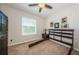 Bedroom with natural light, neutral walls, ceiling fan, and carpet flooring at 5225 5Th N Way, St Petersburg, FL 33703