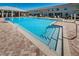The sparkling community pool features easy-access steps and offers a refreshing escape for residents at 5225 5Th N Way, St Petersburg, FL 33703