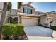 Inviting home exterior with a neutral stucco finish, stone accents and landscaped yard at 5225 5Th N Way, St Petersburg, FL 33703