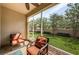 Screened patio with comfortable seating and a view of the well-maintained backyard at 5225 5Th N Way, St Petersburg, FL 33703