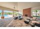 Inviting pool area with brick fireplace and comfortable seating for relaxation, with community pool views and lush landscaping at 5225 5Th N Way, St Petersburg, FL 33703