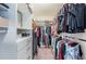Organized walk-in closet featuring ample shelving and hanging storage at 5225 5Th N Way, St Petersburg, FL 33703