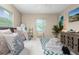 Bright bedroom featuring a comfy bed, ample light, and stylish decor at 616 11Th Nw St, Largo, FL 33770