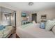 Bright bedroom with large windows, a comfortable bed, and stylish decor at 616 11Th Nw St, Largo, FL 33770
