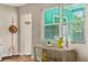 Hallway featuring natural light, modern decor, and views into other areas at 616 11Th Nw St, Largo, FL 33770