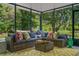 Inviting sunroom with comfortable seating and scenic outdoor views, perfect for relaxation and entertaining at 616 11Th Nw St, Largo, FL 33770