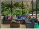 Inviting sunroom with comfortable seating and scenic outdoor views, perfect for relaxation and entertaining at 616 11Th Nw St, Largo, FL 33770