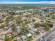 Wide aerial shot highlighting a residential community with nearby amenities, parks and green spaces at 6269 50Th N Ave, St Petersburg, FL 33709