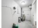 Unfinished basement with water heater and electrical panel at 6269 50Th N Ave, St Petersburg, FL 33709