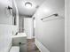 Bathroom featuring updated fixtures, tile, and modern neutral paint at 6269 50Th N Ave, St Petersburg, FL 33709