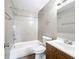 Bright bathroom featuring updated fixtures, a tiled shower over tub, and a modern vanity at 6269 50Th N Ave, St Petersburg, FL 33709
