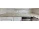 Close up view of the stylish granite countertops, and stainless steel dishwasher in the kitchen at 6269 50Th N Ave, St Petersburg, FL 33709