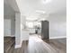 Bright open kitchen features new stainless appliances, modern granite countertops, and white cabinetry at 6269 50Th N Ave, St Petersburg, FL 33709