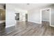 The bright open-concept living area features new flooring and ample space for entertaining at 6269 50Th N Ave, St Petersburg, FL 33709