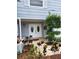 Charming home featuring a double door entrance and landscaped front yard at 6906 Shady Pl, Tampa, FL 33634