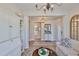 Inviting living room featuring stylish decor, comfortable seating, and an open doorway at 7406 Parkshore Dr, Apollo Beach, FL 33572