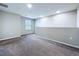 Spacious bedroom featuring neutral walls, carpeted floors, and a window providing natural light at 7554 Wallflower Trl, Wesley Chapel, FL 33545