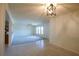 Bright living room featuring ceiling fan and tile floors at 8209 Chaucer Dr, Weeki Wachee, FL 34607