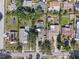 An aerial view of the property showcases its location within a peaceful and well-maintained neighborhood at 911 S Florida Ave, Tarpon Springs, FL 34689