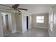 A bright, tiled bedroom with a ceiling fan and closet offers lots of room at 10118 114Th Ter, Largo, FL 33773