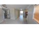 An open-concept living area with modern flooring and recessed lighting at 10118 114Th Ter, Largo, FL 33773