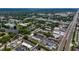 Extensive aerial view featuring the apartment complex near various commercial and residential areas at 1100 East Bay Dr # 42, Largo, FL 33770