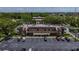 Aerial view showcases the building's layout, with ample parking and surrounding greenery at 1100 East Bay Dr # 42, Largo, FL 33770