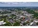 Wide aerial shot of the apartment complex near commercial areas, showcasing accessibility and location at 1100 East Bay Dr # 42, Largo, FL 33770