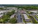 Birds-eye view displays the apartment complex, parking facilities, and adjacent community pool at 1100 East Bay Dr # 42, Largo, FL 33770