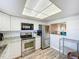 Bright kitchen with stainless steel appliances and breakfast bar. Perfect for cooking and entertaining at 1100 East Bay Dr # 42, Largo, FL 33770