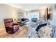 Comfortable living room featuring cozy seating and a bright ambiance for relaxation at 1100 East Bay Dr # 42, Largo, FL 33770
