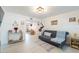 Spacious living room featuring tile floors and an open layout to the kitchen at 11104 Taft Dr, Port Richey, FL 34668